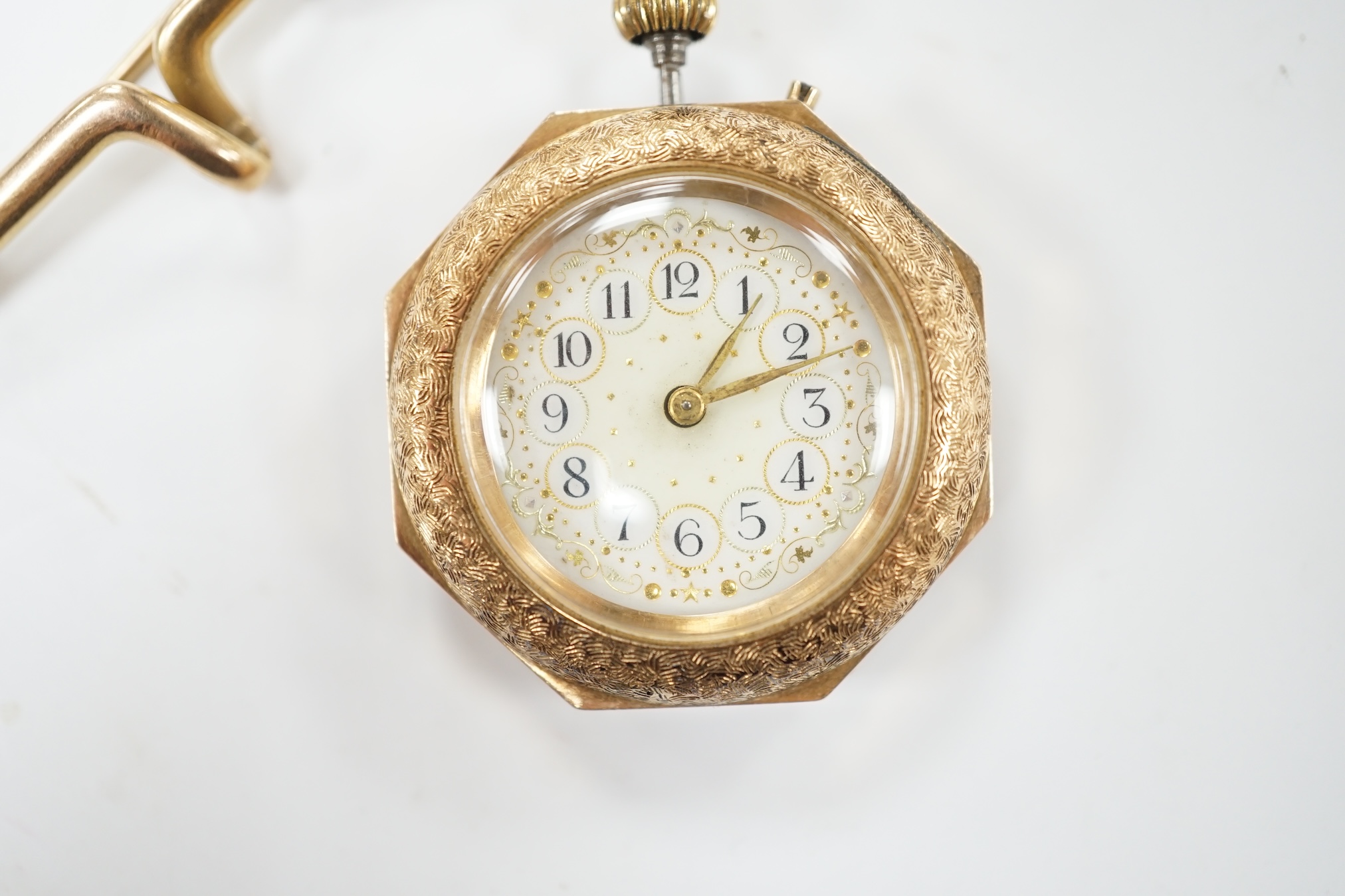 A lady's continental 14k fob watch, with Arabic dial, case diameter 29mm, gross weight 20.4 grams, together with a suspension brooch stamped '15', 3.3 grams. Condition - poor